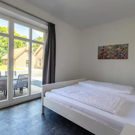 Natura Ferienhaus, In Holte, Komfort Fuer Gaeste & Firmen ,wlan & Parkplatz アパートホテル Rhauderfehn
